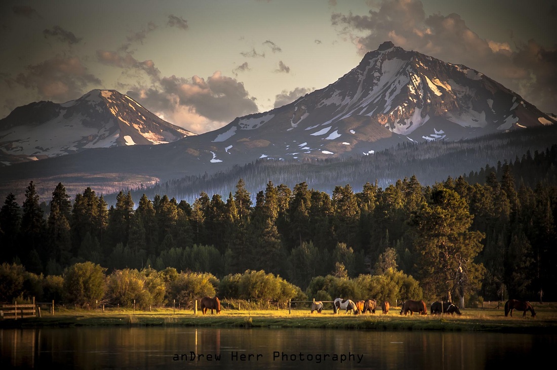 A Black Butte Ranch Sunset of the Sisters Mountain Range in the Cascades , photo by Andrew Herr