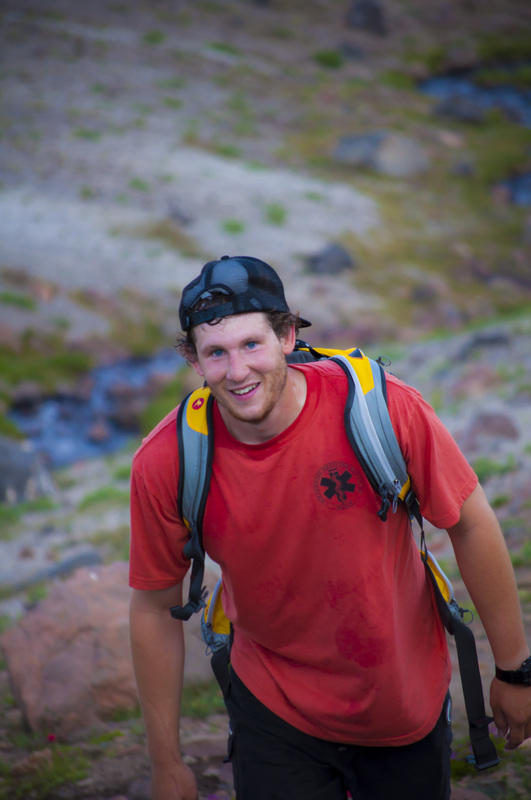 Trevor Lyden hiking Broken Top, photo by Andrew Herr