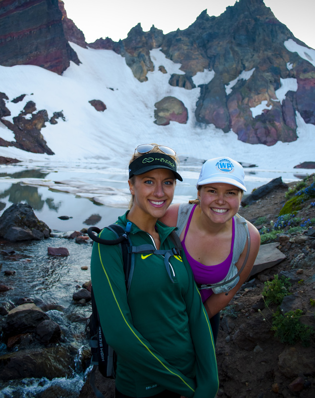Ashlee Francis and Amanda Sarles in front of no-name lake or ruth lake on Broken Top , photo by Andrew Herr