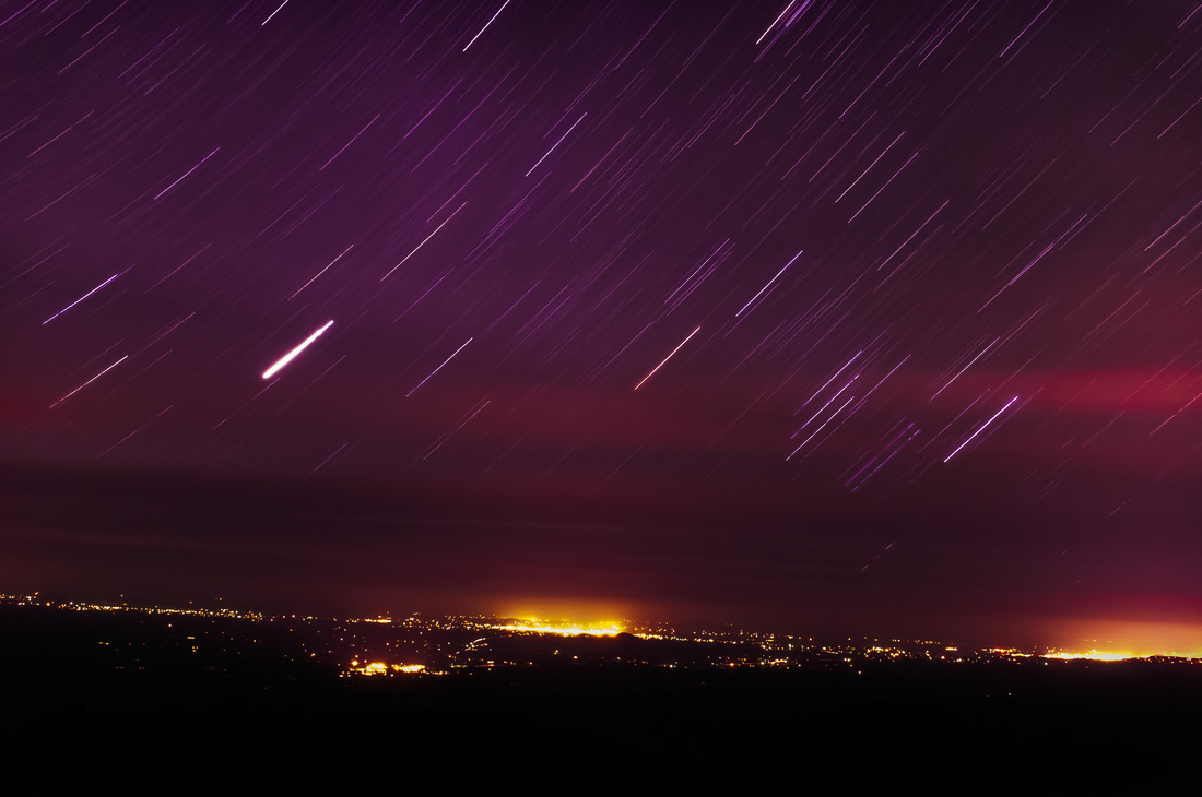 Night time long exposure from Black Crater towards Central Oregon, by Andrew Herr